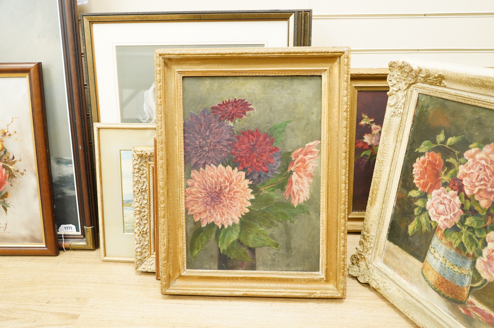 20th century, four still life’s of flowers, each indistinctly signed, oils on canvas, 39 x 34cm